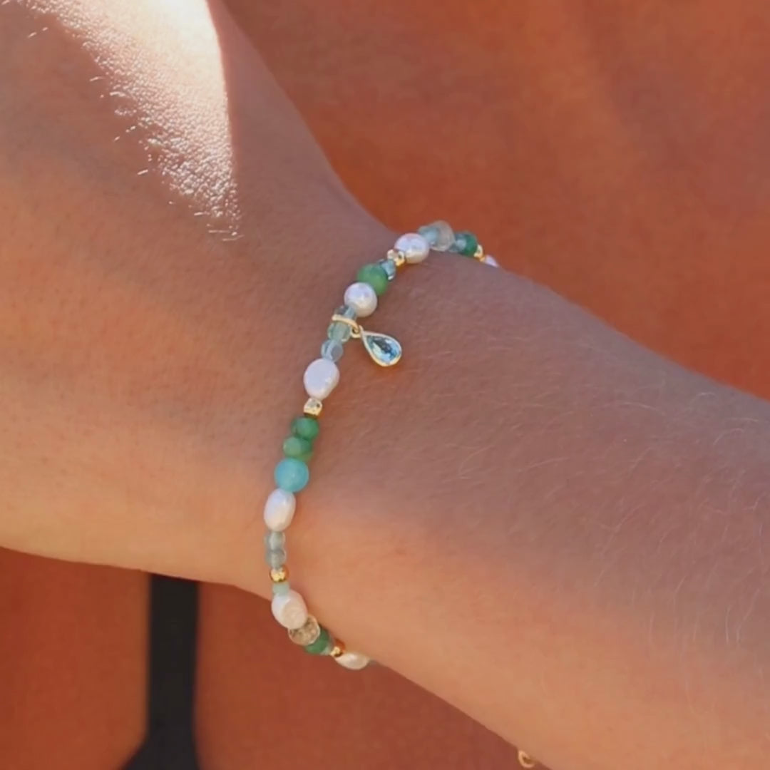 VanddrĂ„beđ§ Pure Perle-armbĂ„nd